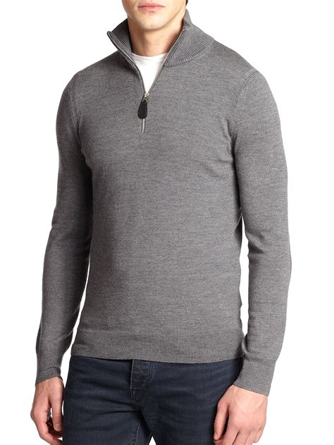 grey burberry sweater.